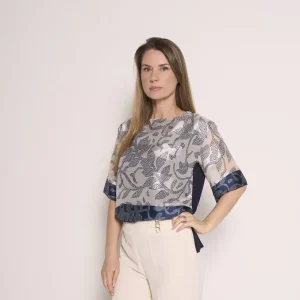 Camicetta con stampa floreale e dettagli a contrasto