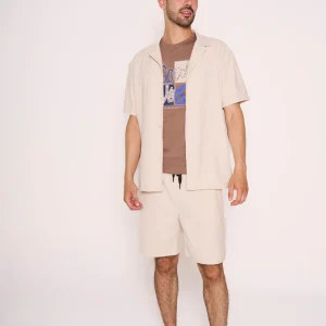 Camiciotto beige con collo bowling