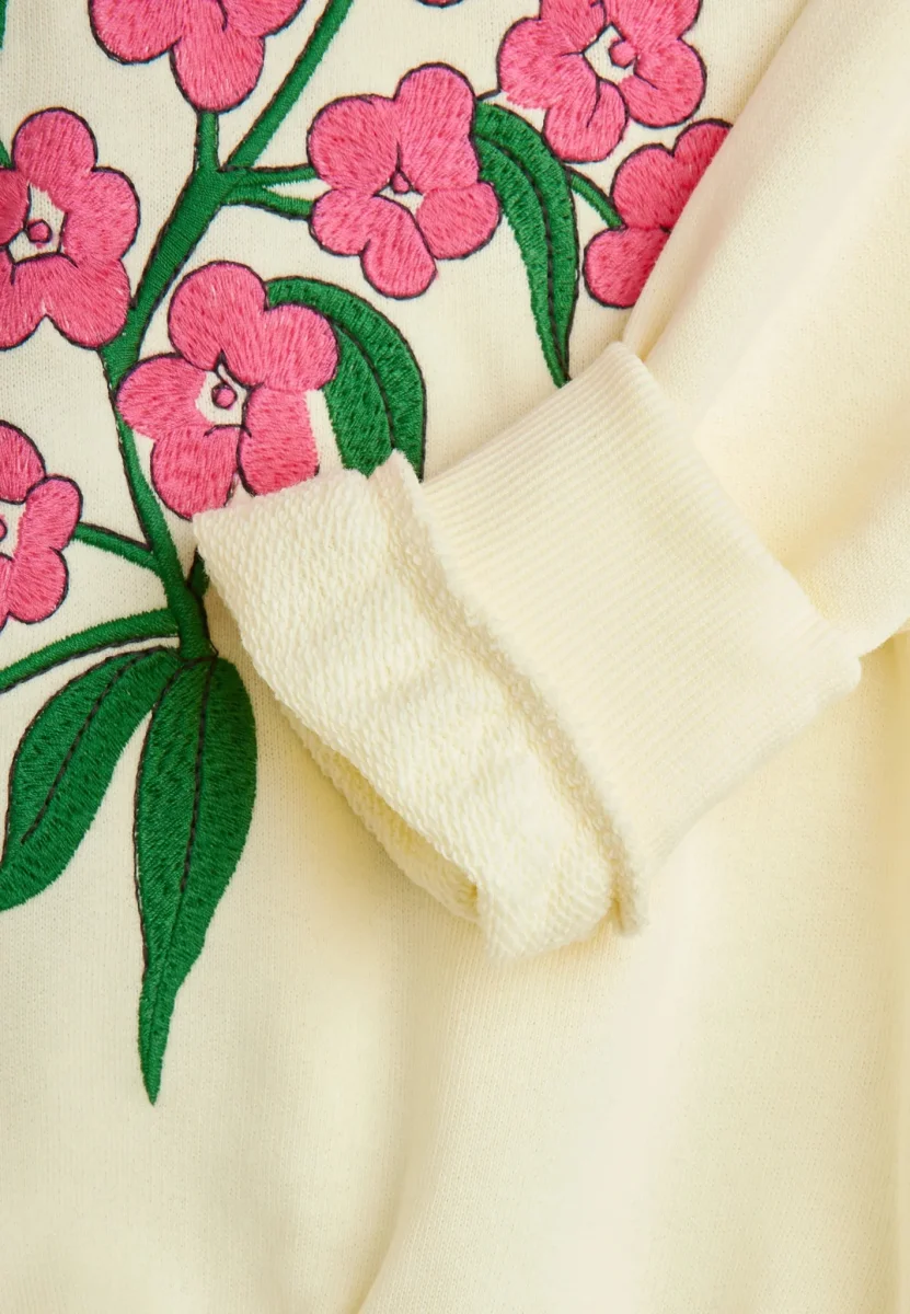 FELPA PANNA CON FIORI ROSA DI MINI RODINI - immagine 4