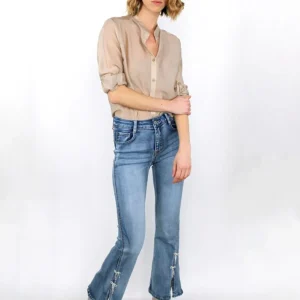 Jeans a zampa con fiocchetti