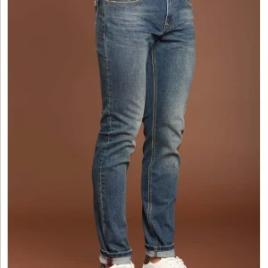 Jeans slim fit con baffature