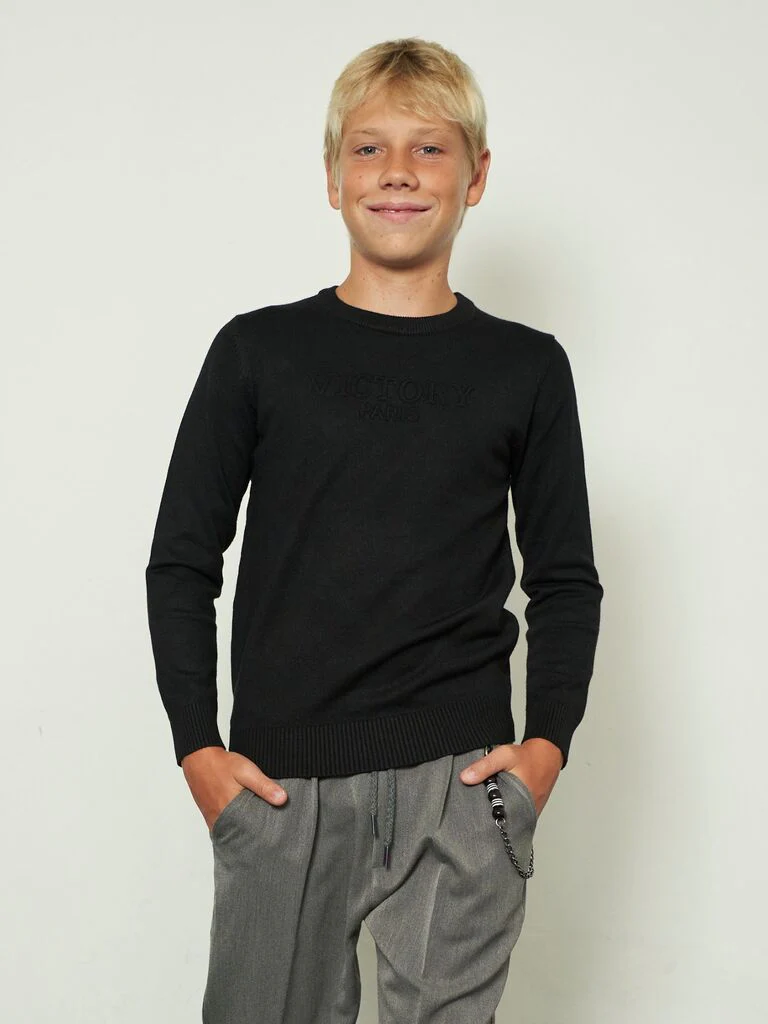 Maglia con scritta in rilievo