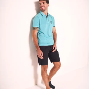 Polo con dettagli a contrasto e patch ricamate